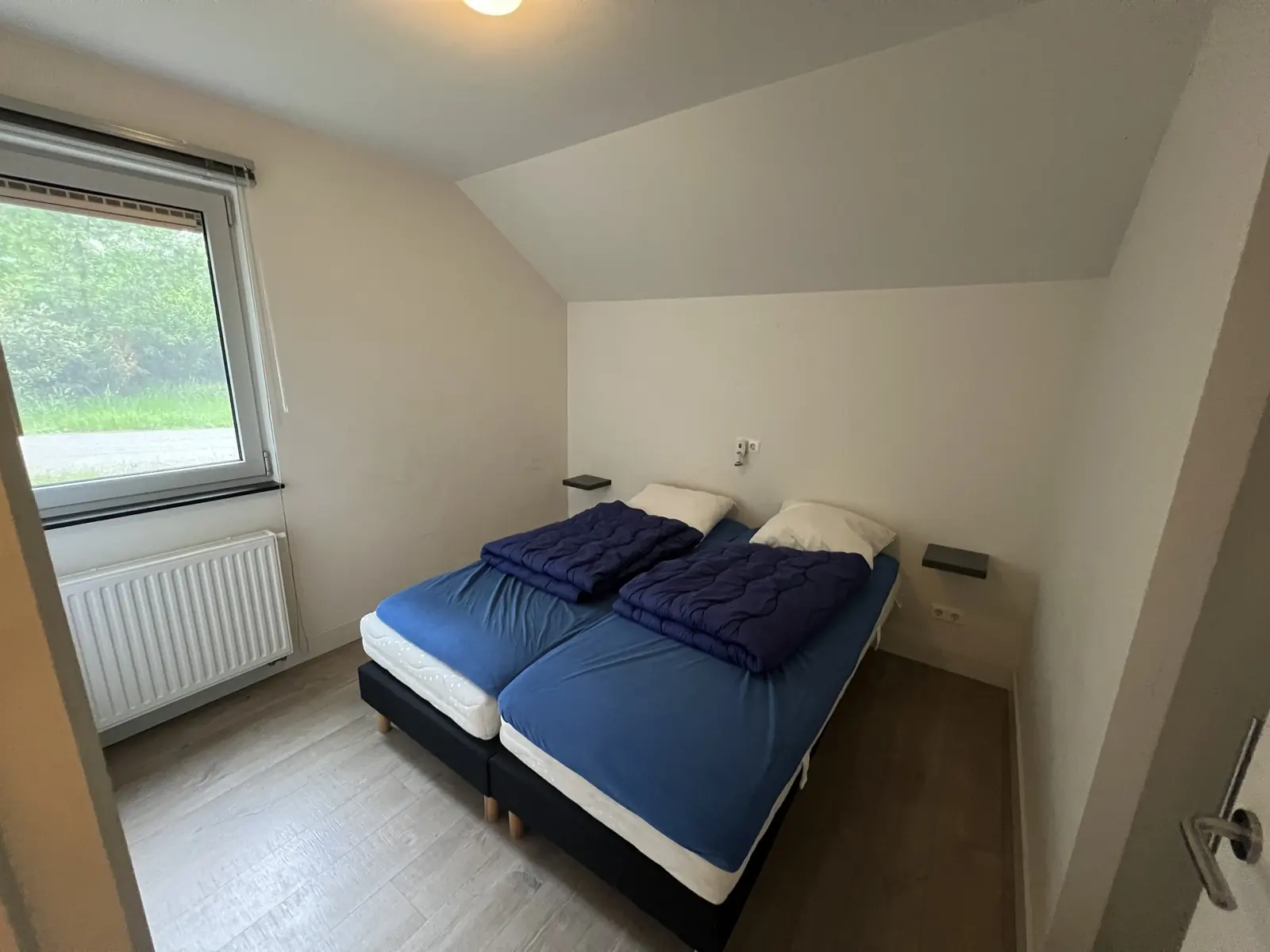 Bedroom with two single beds pushed together