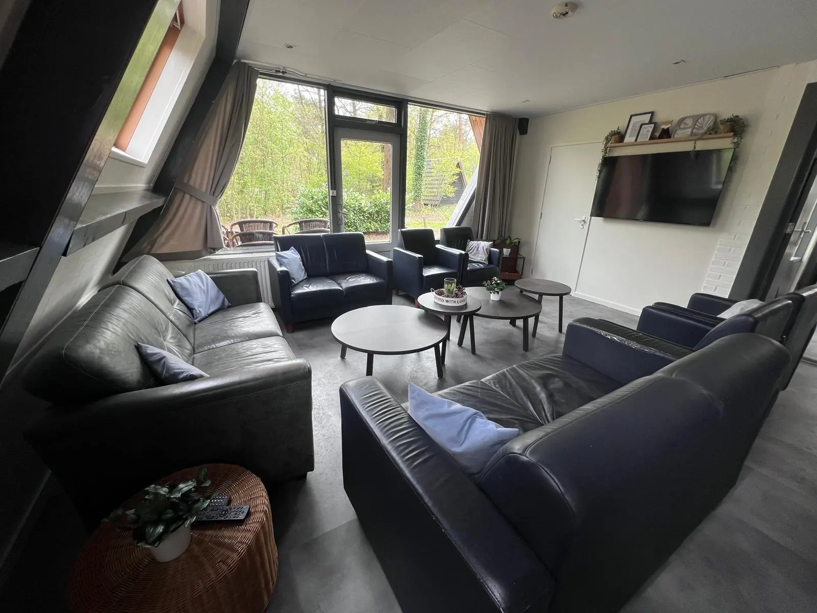 The living room from the other side, television on the wall
